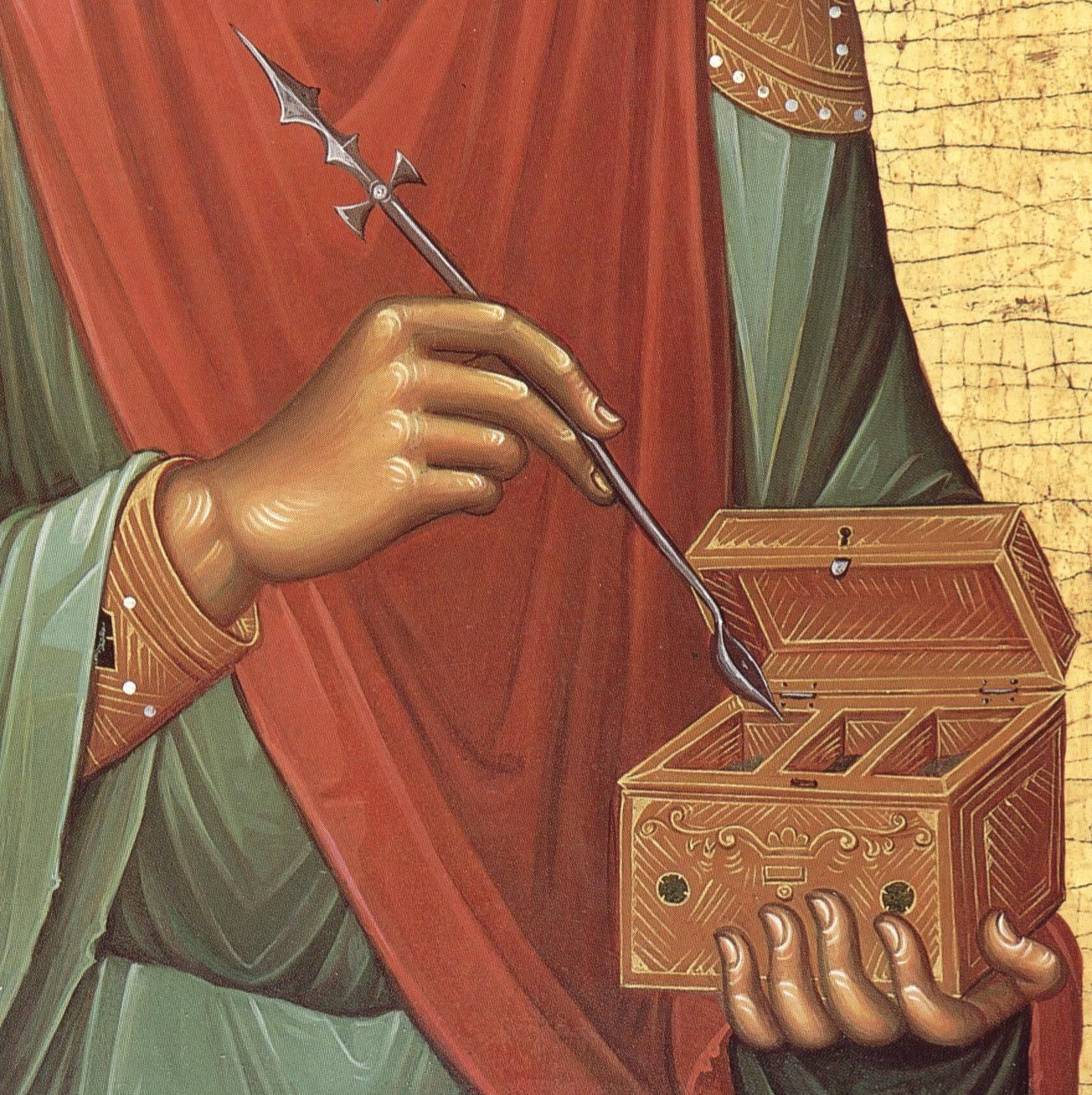 Hands of St. Panteleimon holding a cross and medicine box Hands of St. Panteleimon holding a cross and medicine box