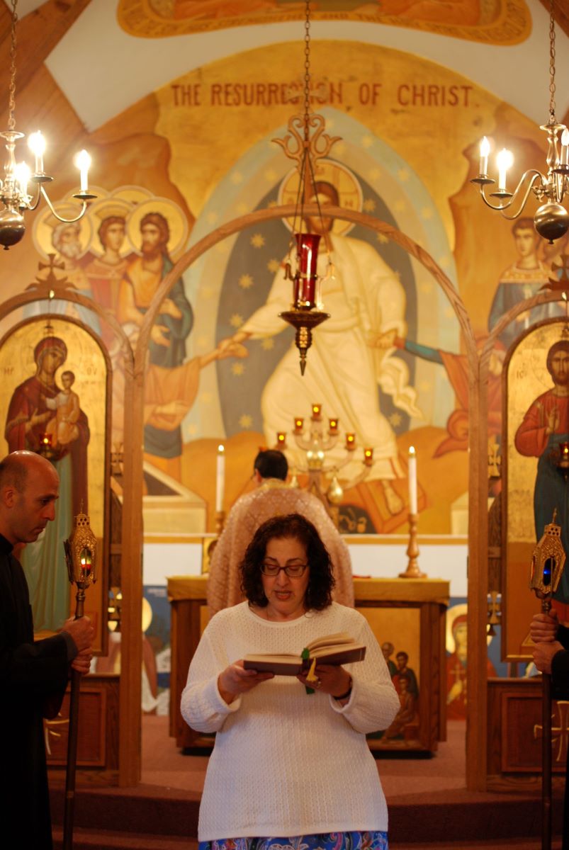 Woman reading the epistle in church Woman reading the epistle in church