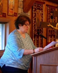 Woman at the chanting stand