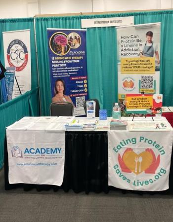 Booth with tables and posters